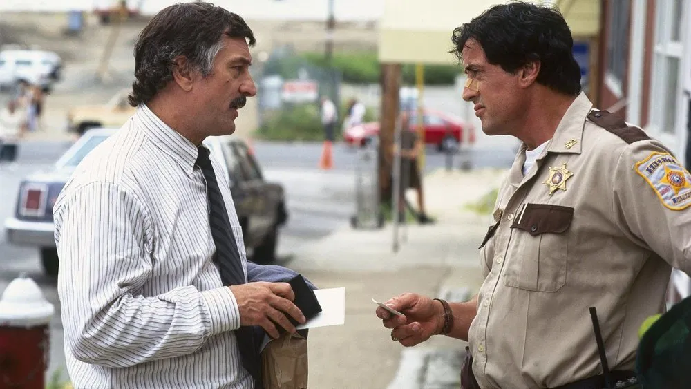 Image of Robert De Niro in Cop Land part of the curated by uncle quiz Robert De Niro in 25 Frames: A Movie Quiz for the Truly Obsessed