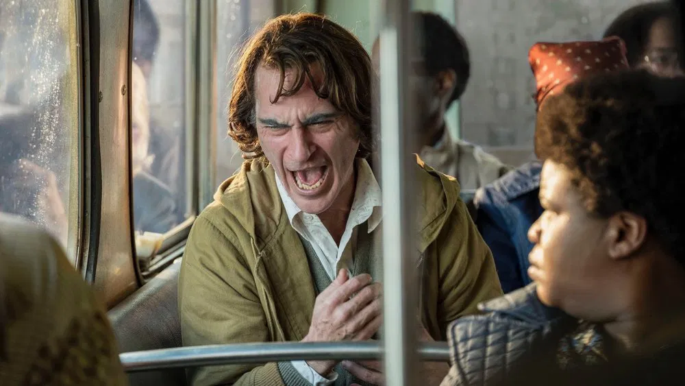 image of arthur fleck on the bus from the movie joker 2019