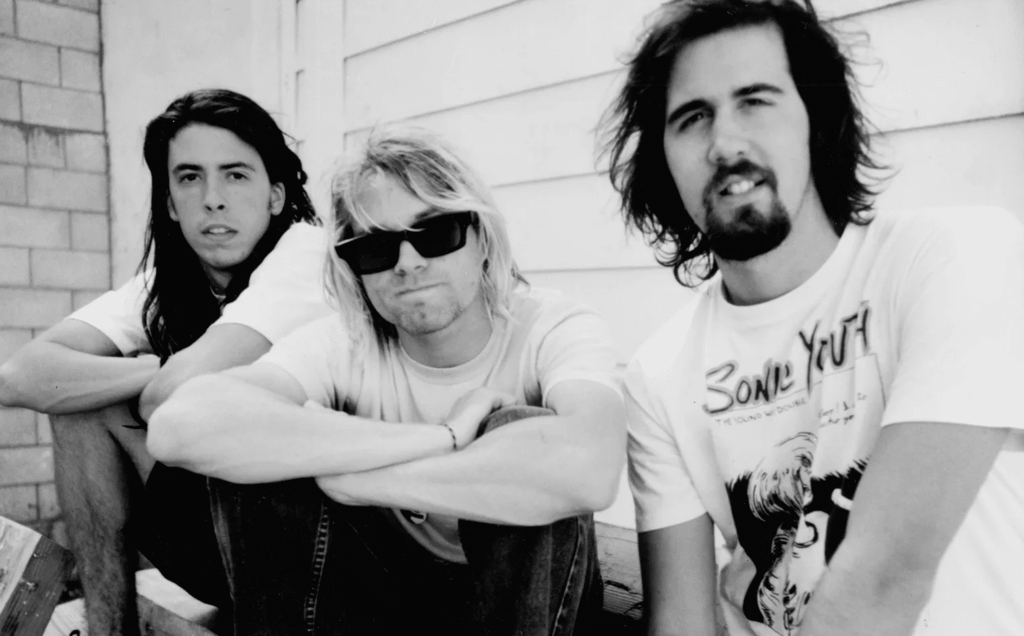 black and white band press photo of nirvana