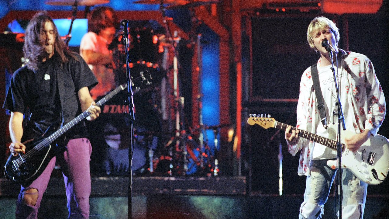 Image: Krist Novoselic of Nirvana being hit in the face with his bass, 1991 MTV VMAs