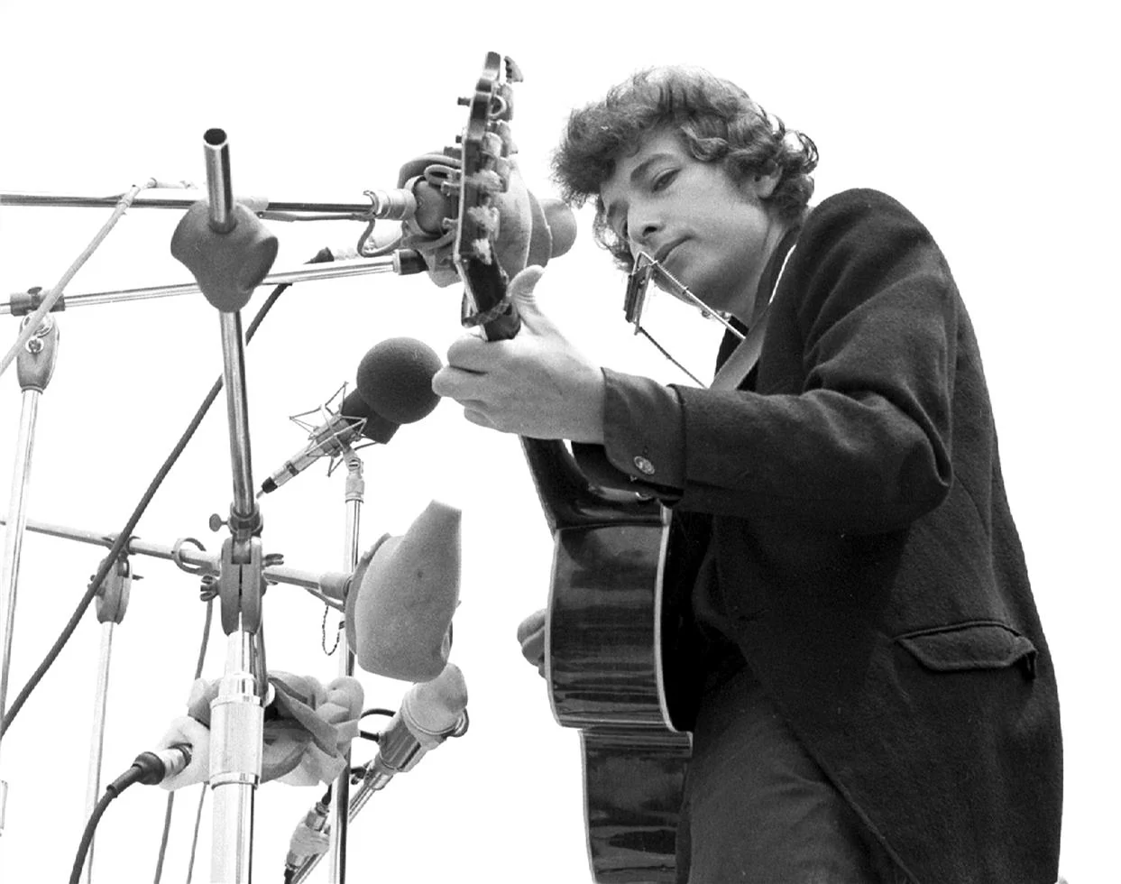 Image: Bob Dylan with electric guitar at Newport Folk Festival, 1965