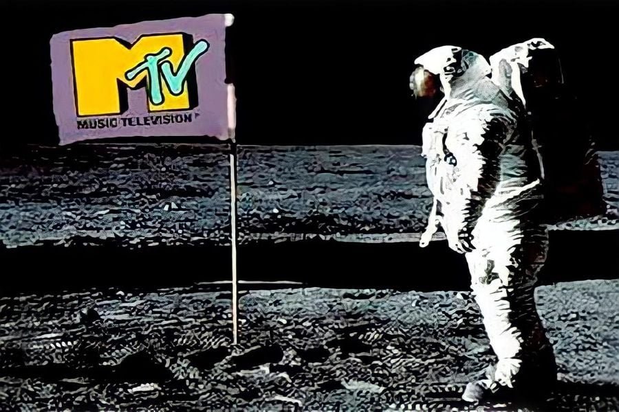 Image: First-ever broadcast on MTV showing astronaut on moon with mtv flag on screen, 1981