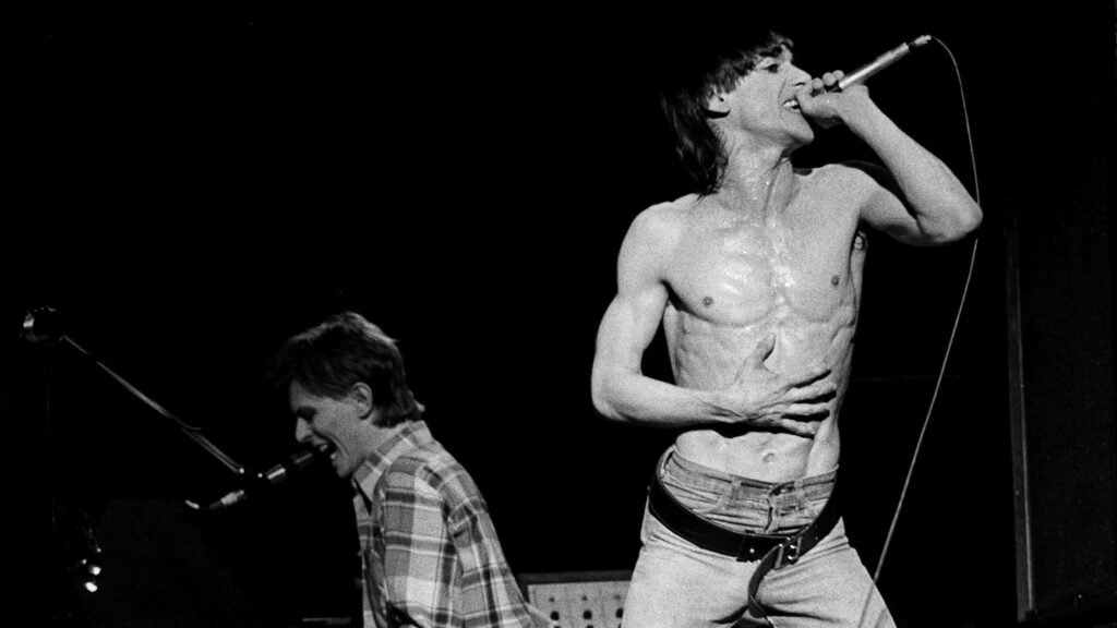 black and white photo of iggy pop and david bowie  live in San Francisco 1977