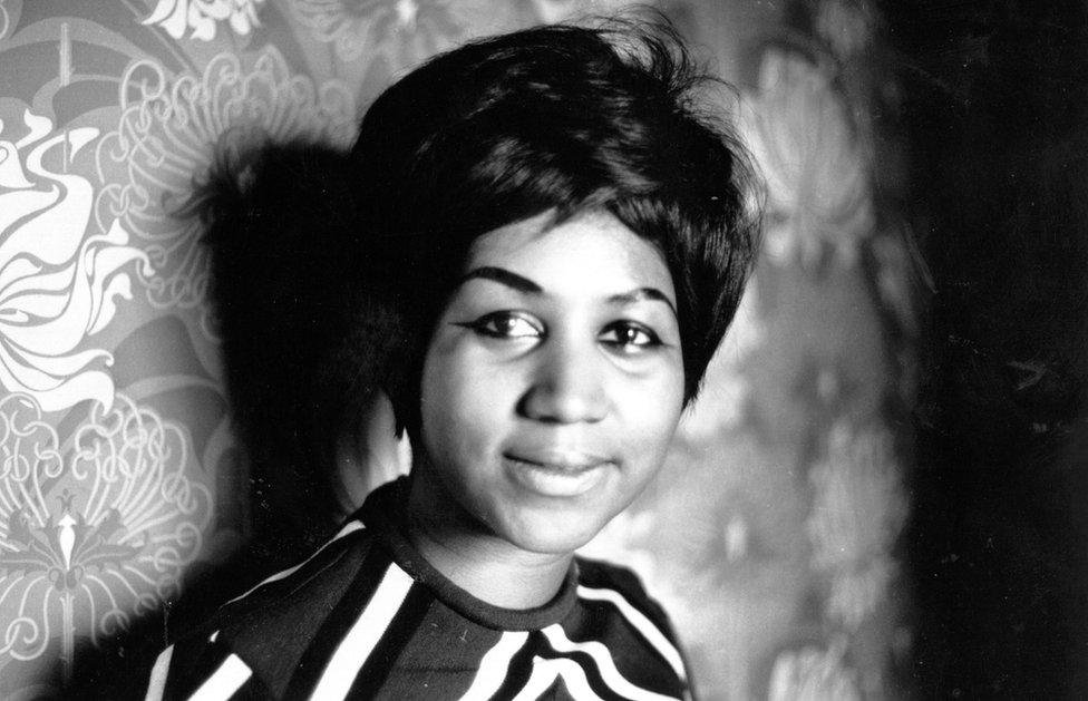 black and white photo of aretha franklin in the 1960s