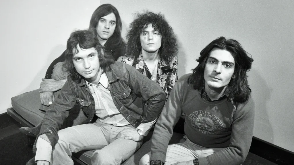 black and white band photo of the band t rex